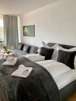 Ein Bett oder Betten in einem Zimmer der Unterkunft Seeblickapp. „Eure Auszeit“