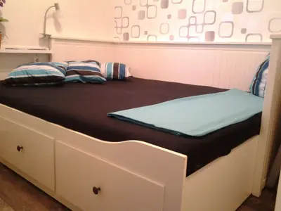 Ein Bett oder Betten in einem Zimmer der Unterkunft Ferienwohnung Sonnenblick