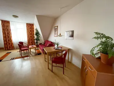 Ein Sitzbereich in der Unterkunft Altwernigeröder Apparthotel