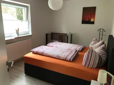 Ein Bett oder Betten in einem Zimmer der Unterkunft Karins Ferienwohnung