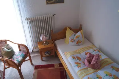 Ein Bett oder Betten in einem Zimmer der Unterkunft Pension Jagdhütte