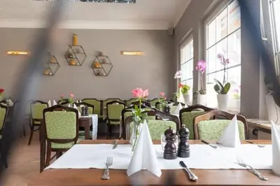 Ein Restaurant oder anderes Speiselokal in der Unterkunft Ferienwohnung Bergwichtel Hahnenklee 