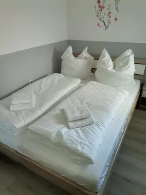 Ein Bett oder Betten in einem Zimmer der Unterkunft Ferienwohnung Bergwichtel Hahnenklee 
