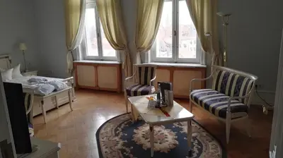 Ein Sitzbereich in der Unterkunft Schlosshotel zum Markgrafen