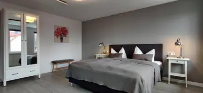 Ein Bett oder Betten in einem Zimmer der Unterkunft Großes schönes Ferienhaus mit Garten für 12 Personen erwartet Sie im Harz!