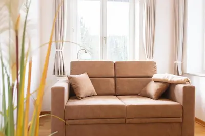 Ein Sitzbereich in der Unterkunft Ferienwohnung an der Salamanderburg