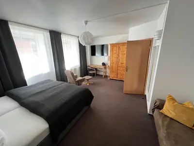 Ein Bett oder Betten in einem Zimmer der Unterkunft Hotel Abtshof