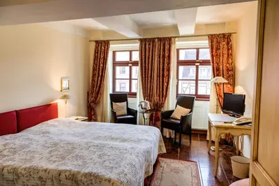 Ein Bett oder Betten in einem Zimmer der Unterkunft Hotel Zum Bär