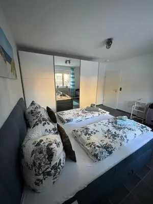 Ein Bett oder Betten in einem Zimmer der Unterkunft International 4
