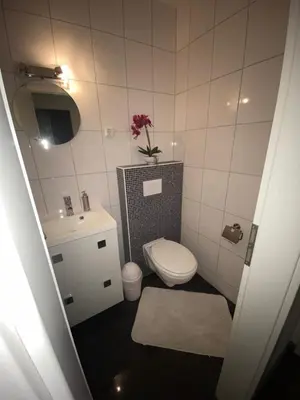 Ein Badezimmer in der Unterkunft International 4