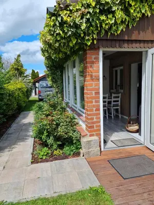 Ein Garten an der Unterkunft Harznester - Ferienhaus am Horstberg