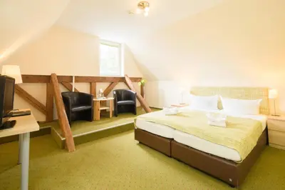 Ein Bett oder Betten in einem Zimmer der Unterkunft Altes Forsthaus Braunlage