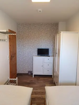 Ein Bett oder Betten in einem Zimmer der Unterkunft Pepe