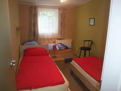 Ein Bett oder Betten in einem Zimmer der Unterkunft Eichhörnchen Wernigerode
