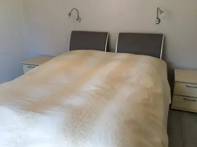 Ein Bett oder Betten in einem Zimmer der Unterkunft Relax im Wald