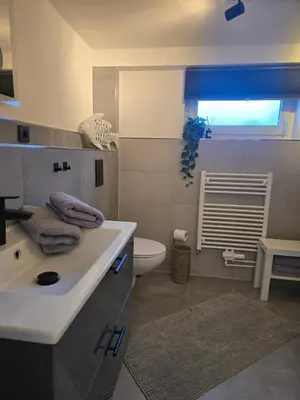 Ein Badezimmer in der Unterkunft Ferienwohnung am Wildgehege