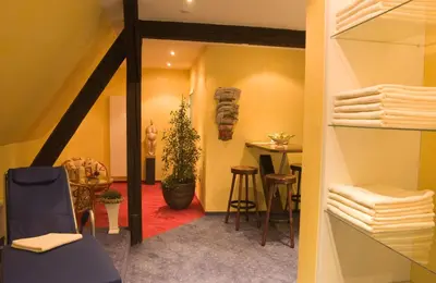 Ein Sitzbereich in der Unterkunft Parkhotel Unter den Linden