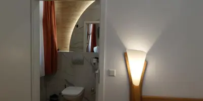 Ein Badezimmer in der Unterkunft La Rustica Altstadthotel