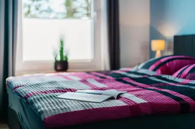 Ein Bett oder Betten in einem Zimmer der Unterkunft Walpurgis Hexe