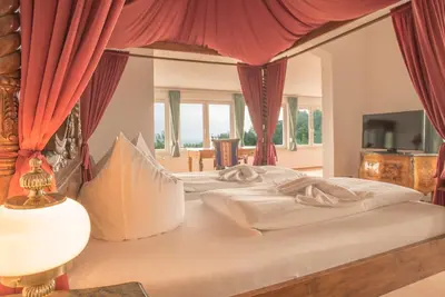 Ein Bett oder Betten in einem Zimmer der Unterkunft Berggasthof Ziegenkopf