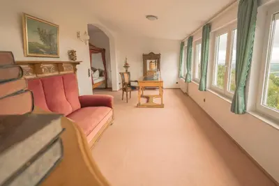 Ein Sitzbereich in der Unterkunft Berggasthof Ziegenkopf