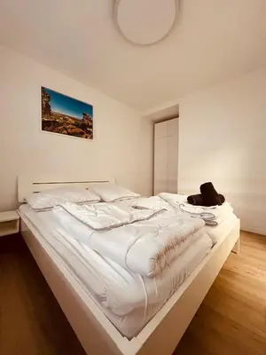 Ein Bett oder Betten in einem Zimmer der Unterkunft Waldhaus Harz, Natur pur mit Pool, Sauna und traumhaften Garten
