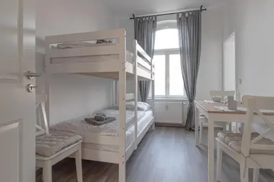 Ein Bett oder Betten in einem Zimmer der Unterkunft Ferienwohnungen Quedlinburg im Harz