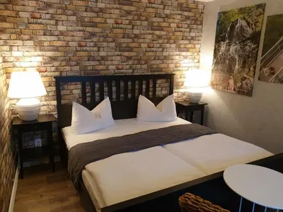 Ein Bett oder Betten in einem Zimmer der Unterkunft Hotel Kammerkrug
