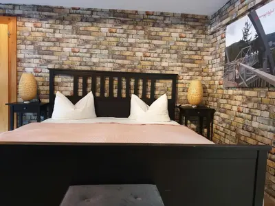 Ein Bett oder Betten in einem Zimmer der Unterkunft Hotel Kammerkrug
