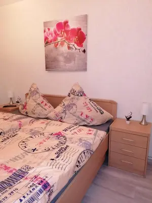 Ein Bett oder Betten in einem Zimmer der Unterkunft CrisAnd Wald &Terrasse