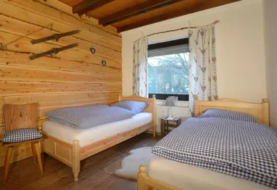 Ein Bett oder Betten in einem Zimmer der Unterkunft LIGHTQUARTIER Harzklopfen - Große Wohnung - Balkon - Harzstyle