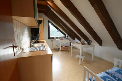 Ein Bett oder Betten in einem Zimmer der Unterkunft LIGHTQUARTIER Harzklopfen - Große Wohnung - Balkon - Harzstyle