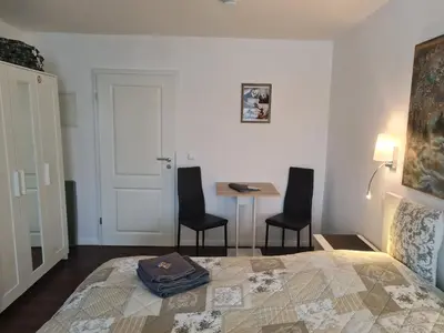 Ein Bett oder Betten in einem Zimmer der Unterkunft Harz Pension