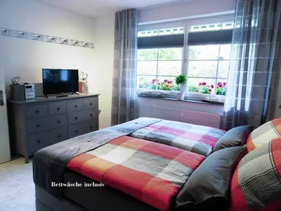 Ein Bett oder Betten in einem Zimmer der Unterkunft Ferienwohnung Krekel in ruhiger Lage inklusiv Wäschepaket, WLAN, Parkplatz