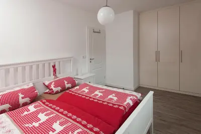 Ein Bett oder Betten in einem Zimmer der Unterkunft Apartment an der Wurmbergseilbahn 1