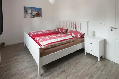 Ein Bett oder Betten in einem Zimmer der Unterkunft Apartment an der Wurmbergseilbahn 1