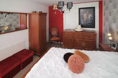 Ein Bett oder Betten in einem Zimmer der Unterkunft Design-Ferienwohnungen Stadtidyll