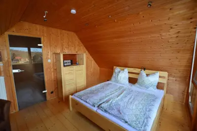 Ein Bett oder Betten in einem Zimmer der Unterkunft Haus Harzblick