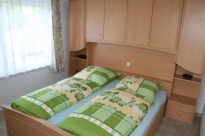 Ein Bett oder Betten in einem Zimmer der Unterkunft Ferienhaus Grimm