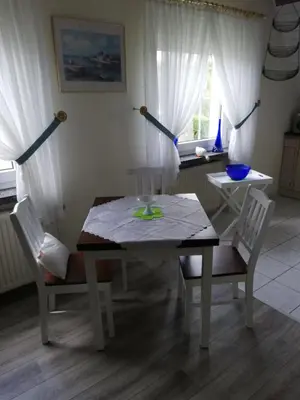 Ein Sitzbereich in der Unterkunft Ferienwohnung Hertha