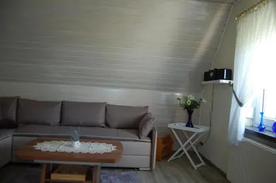 Ein Sitzbereich in der Unterkunft Ferienwohnung Hertha