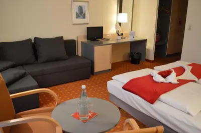 Ein Sitzbereich in der Unterkunft CAREA Residenz Hotel Harzhöhe