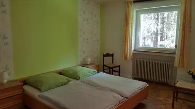 Ein Bett oder Betten in einem Zimmer der Unterkunft Ferienhaus Monarda