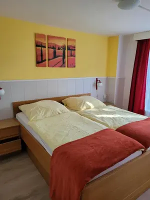 Ein Bett oder Betten in einem Zimmer der Unterkunft Ferienhaus Monarda