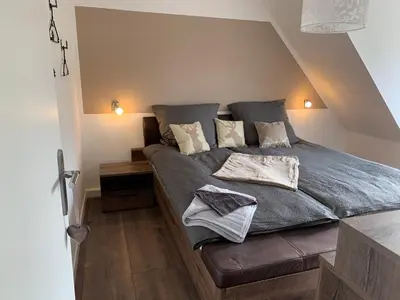 Ein Bett oder Betten in einem Zimmer der Unterkunft Harzstübl25