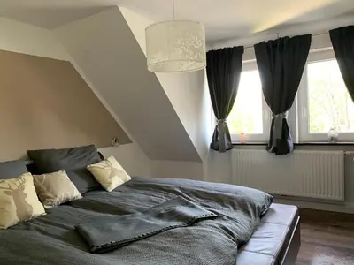 Ein Bett oder Betten in einem Zimmer der Unterkunft Harzstübl25