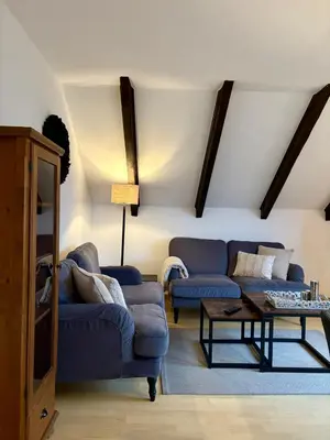 Ein Sitzbereich in der Unterkunft Haus Im Arnikagrund - Ferienwohnung & Privatzimmer