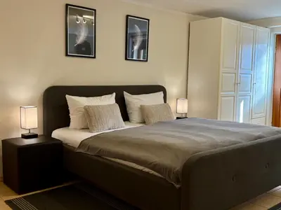 Ein Bett oder Betten in einem Zimmer der Unterkunft Haus Im Arnikagrund - Ferienwohnung & Privatzimmer