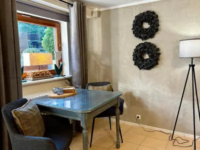 Ein Sitzbereich in der Unterkunft Haus Im Arnikagrund - Ferienwohnung & Privatzimmer