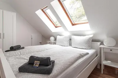 Ein Bett oder Betten in einem Zimmer der Unterkunft Ferienwohnung Quedlinburg Harz